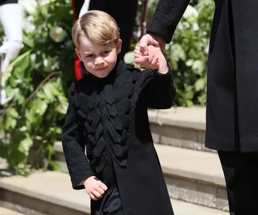 Prince George comforted a crying bridesmaid at the royal wedding