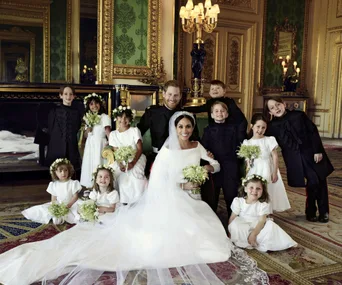 Royal wedding photographer admits he had to bribe Prince George to smile
