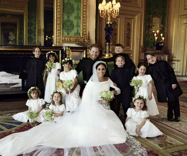 Royal wedding photographer admits he had to bribe Prince George to smile