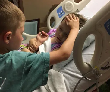 This moving image of a young boy saying goodbye to his dying sister will break your heart