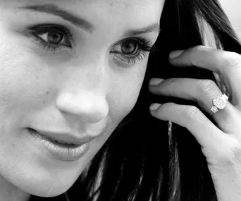 Duchess Meghan has the sweetest reaction when she sees her wedding dress for the first time, new footage reveals