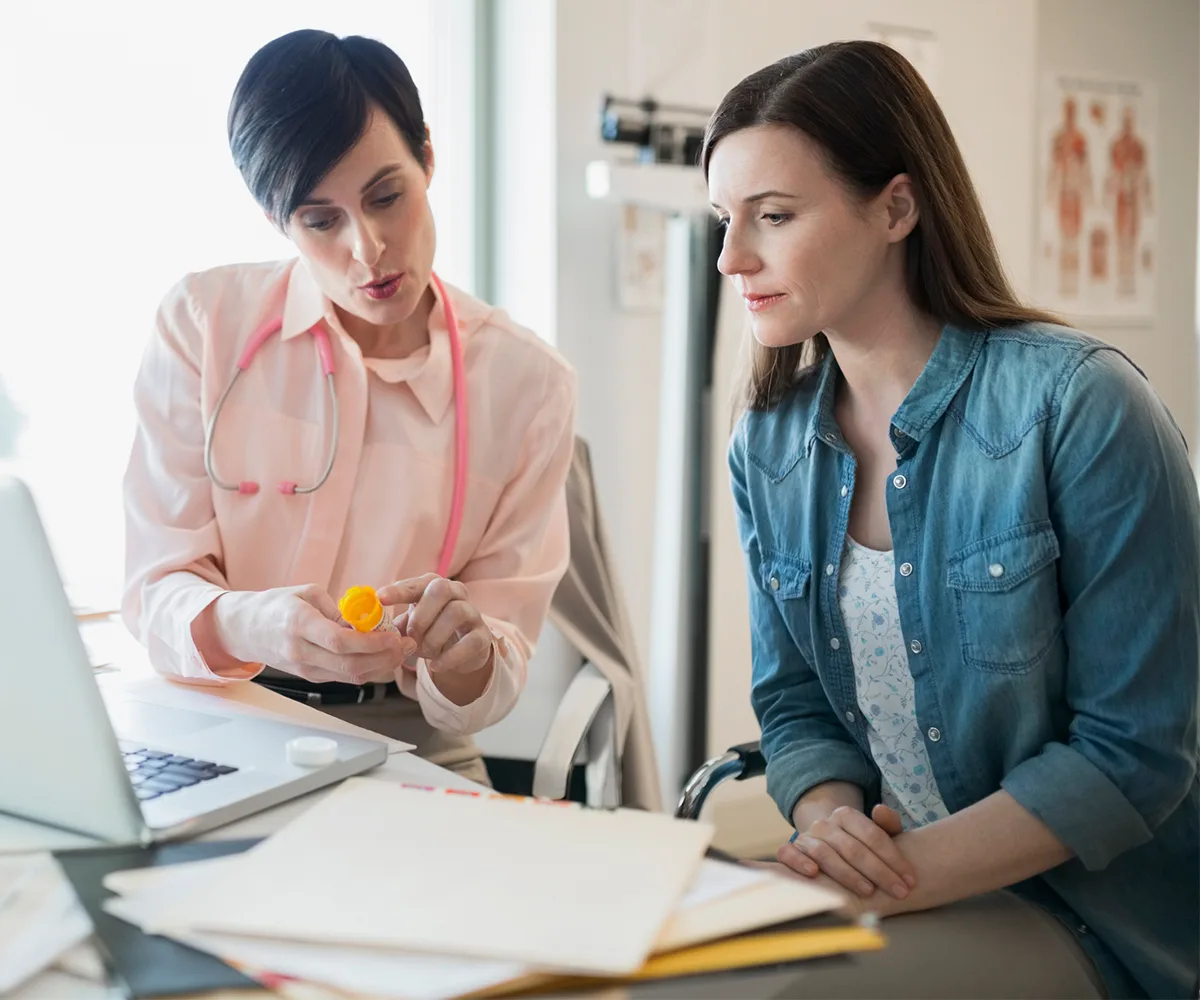 Female doctor consults patient