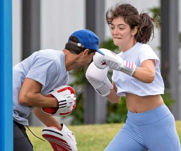 Lorde shows her personal trainer who’s boss during an intense boxing bootcamp workout