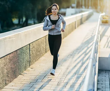 brunette woman running
