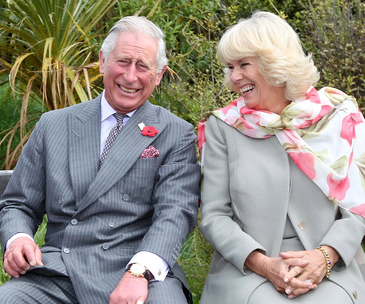 prince charles and camilla laughing 