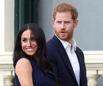 prince harry and meghan markle smiling