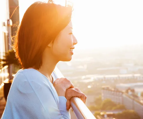 woman smiling sunset