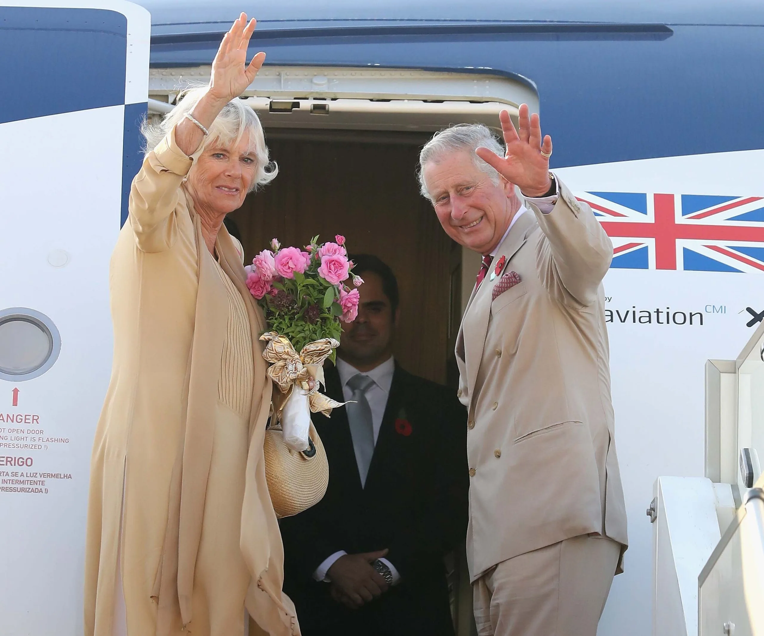 prince charles and camilla getting on a plane