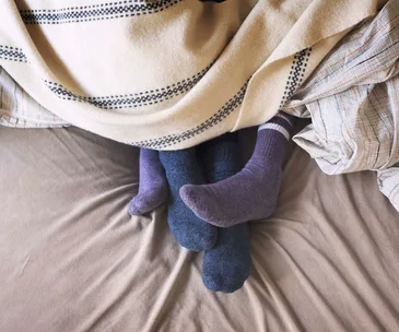Turns out wearing socks to bed is anything BUT unsexy – here’s why