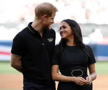 prince harry and meghan markle smiling 
