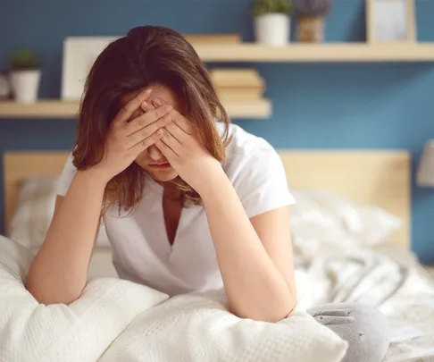 Unhappy girl waking up sad