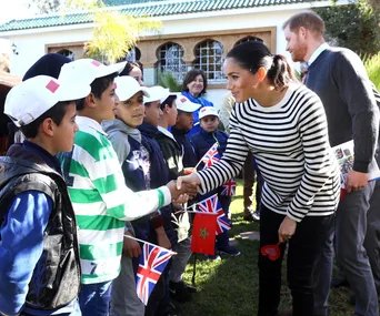 meghan markle and prince harry greet children in morocco