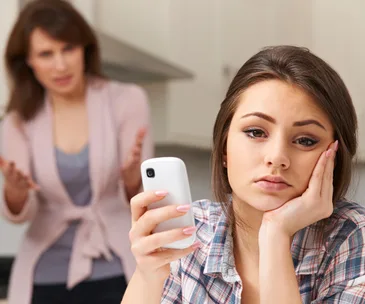 Teenage girl ignoring her mother