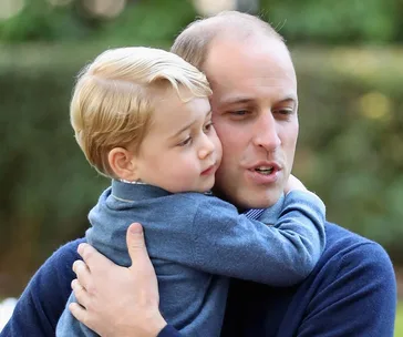 prince george hugging prince william 