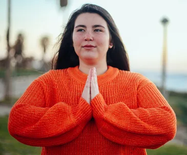Woman doing yoga in park