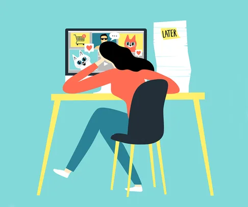 Girl watching funny pictures and video instead of working