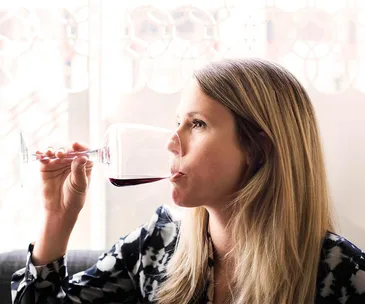 woman drinking red wine