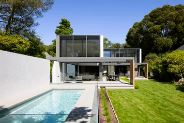 This home has achieved seamless indoor-outdoor flow with open living spaces for the family to entertain