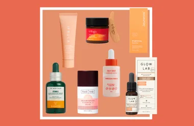 Various skincare products, including serums and masks, with diverse packaging and branding displayed against a coral background.