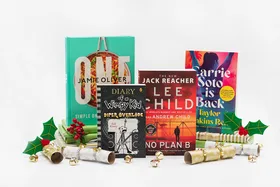 Books: "One" by Jamie Oliver, "Diary of a Wimpy Kid", "No Plan B", "Carrie Soto is Back" with Christmas decor.