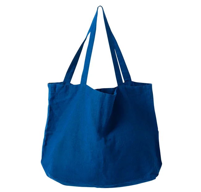 Blue linen tote bag with dual handles, against a white background.