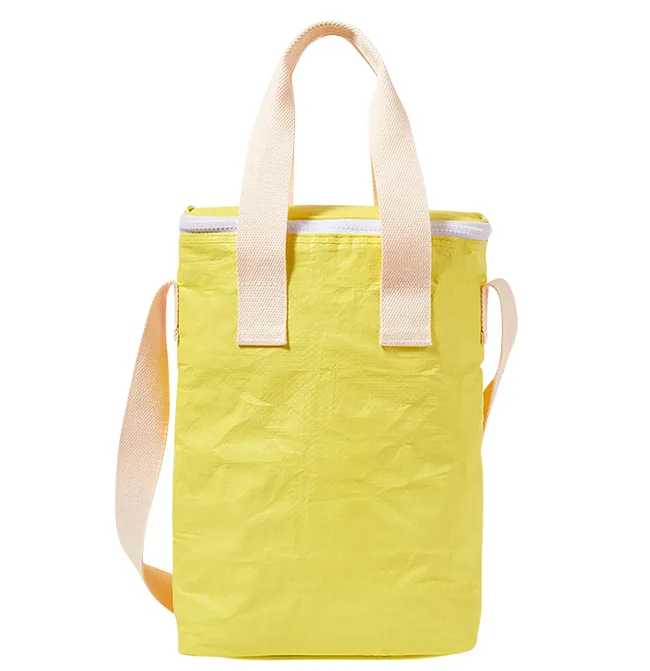 Yellow insulated lunch bag with beige handles and strap.