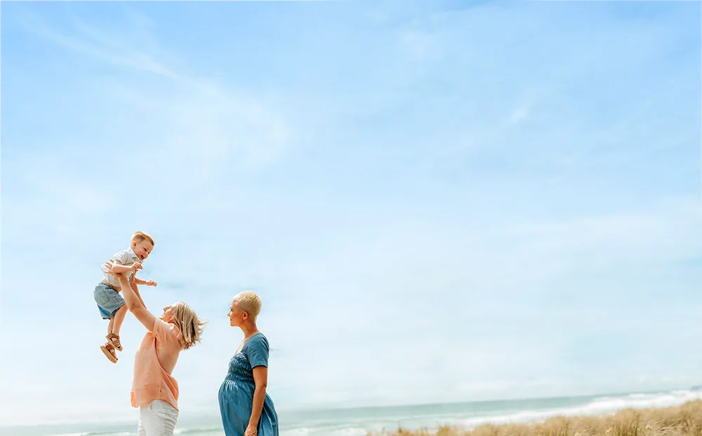 Kelly Brazier with her family on a beach