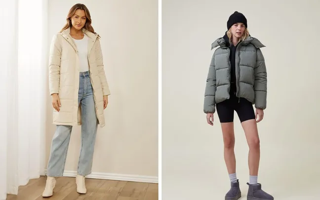 Two women showcasing winter fashion: one in a long beige coat and jeans, the other in a green puffer jacket and black shorts.
