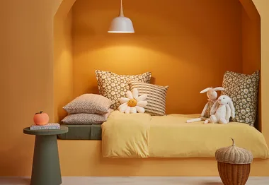 How to create a child’s bed nook with soft, warming hues