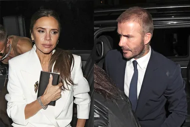 Two people dressed in formal attire sit in a car; the woman wears a white blazer, the man wears a dark suit and tie.