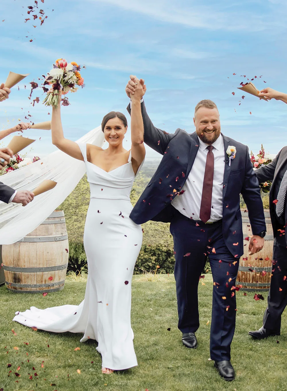 Tom Walsh walks wife Dana down the aisle after the ceremony