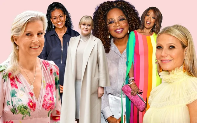 Women in colorful and formal outfits stand against a pastel background, smiling at the camera.