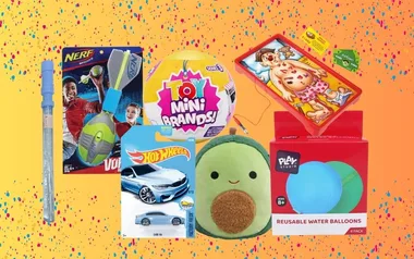 Assorted toys on a colorful background, including Nerf, Toy Mini Brands, Hot Wheels, and plush avocado.