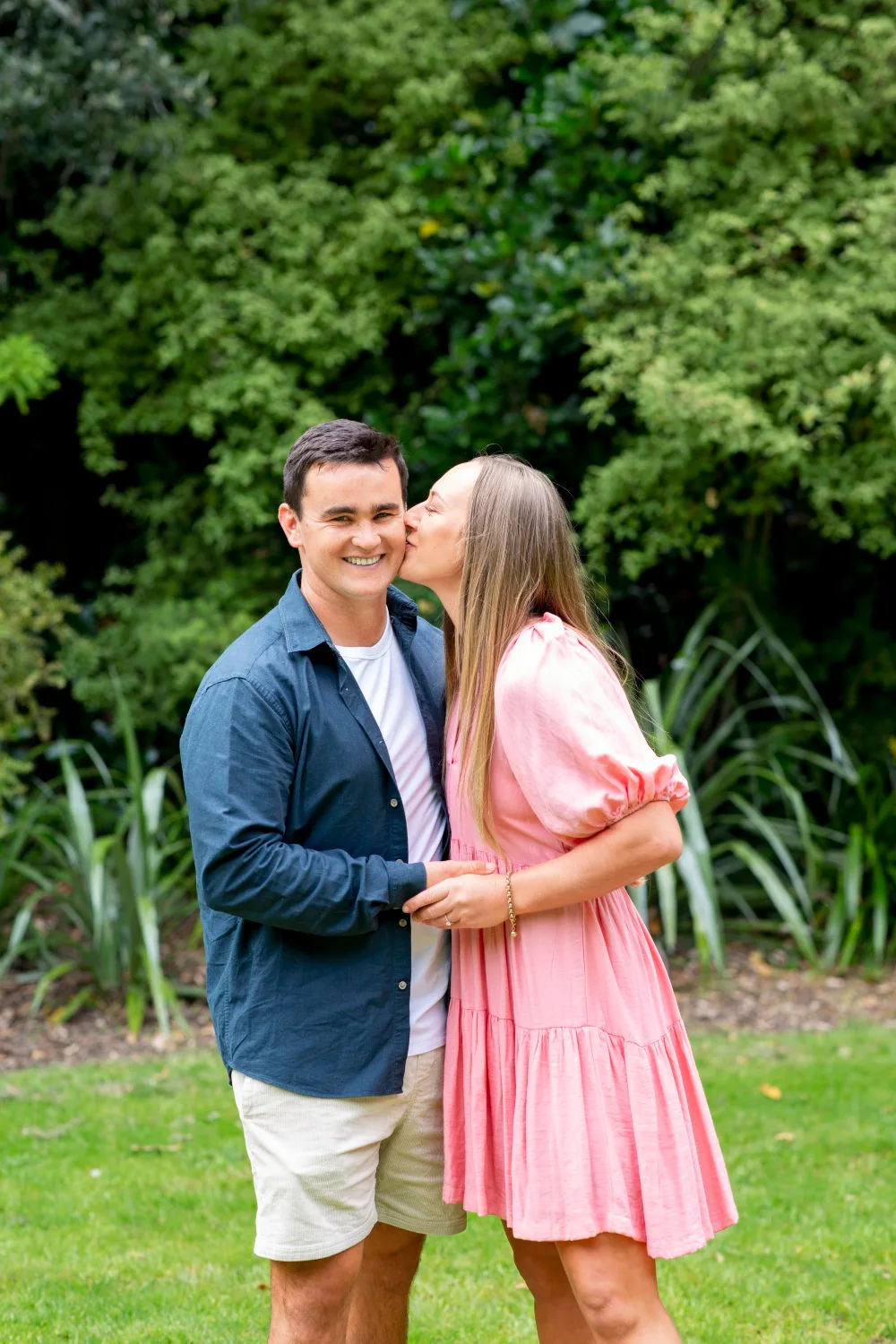 Tori Peeters kissing partner Cam on the cheek