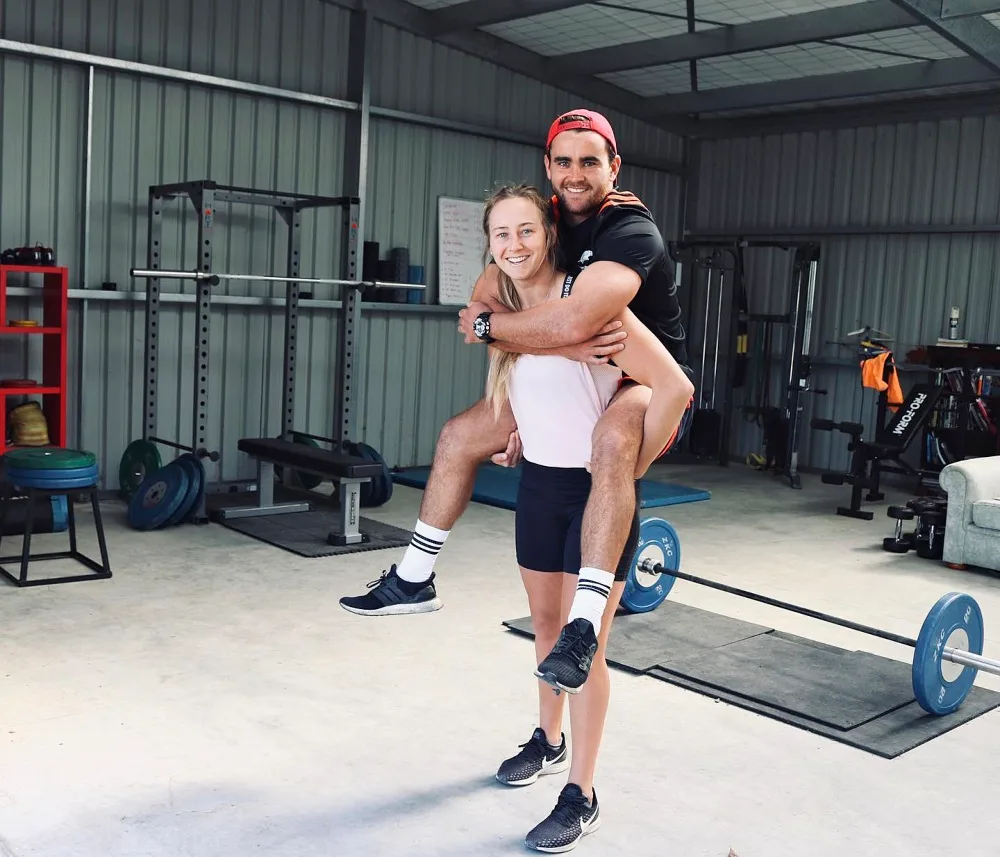 Tori Peeters piggybacking her partner