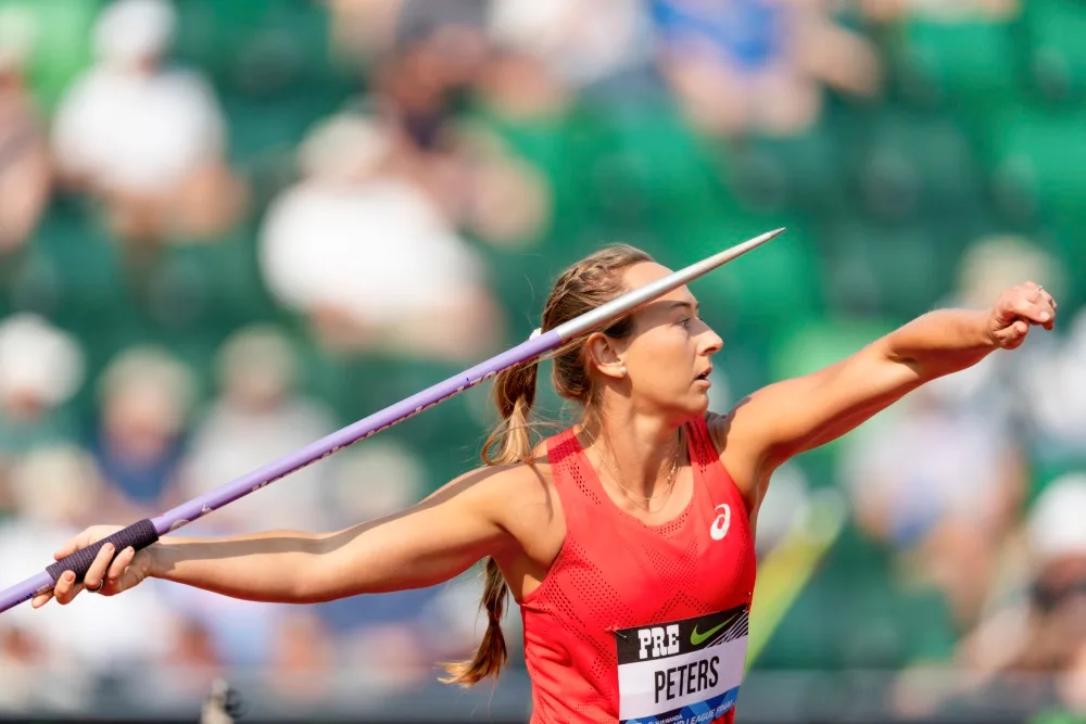 Tori Peeters in action throwing a javelin