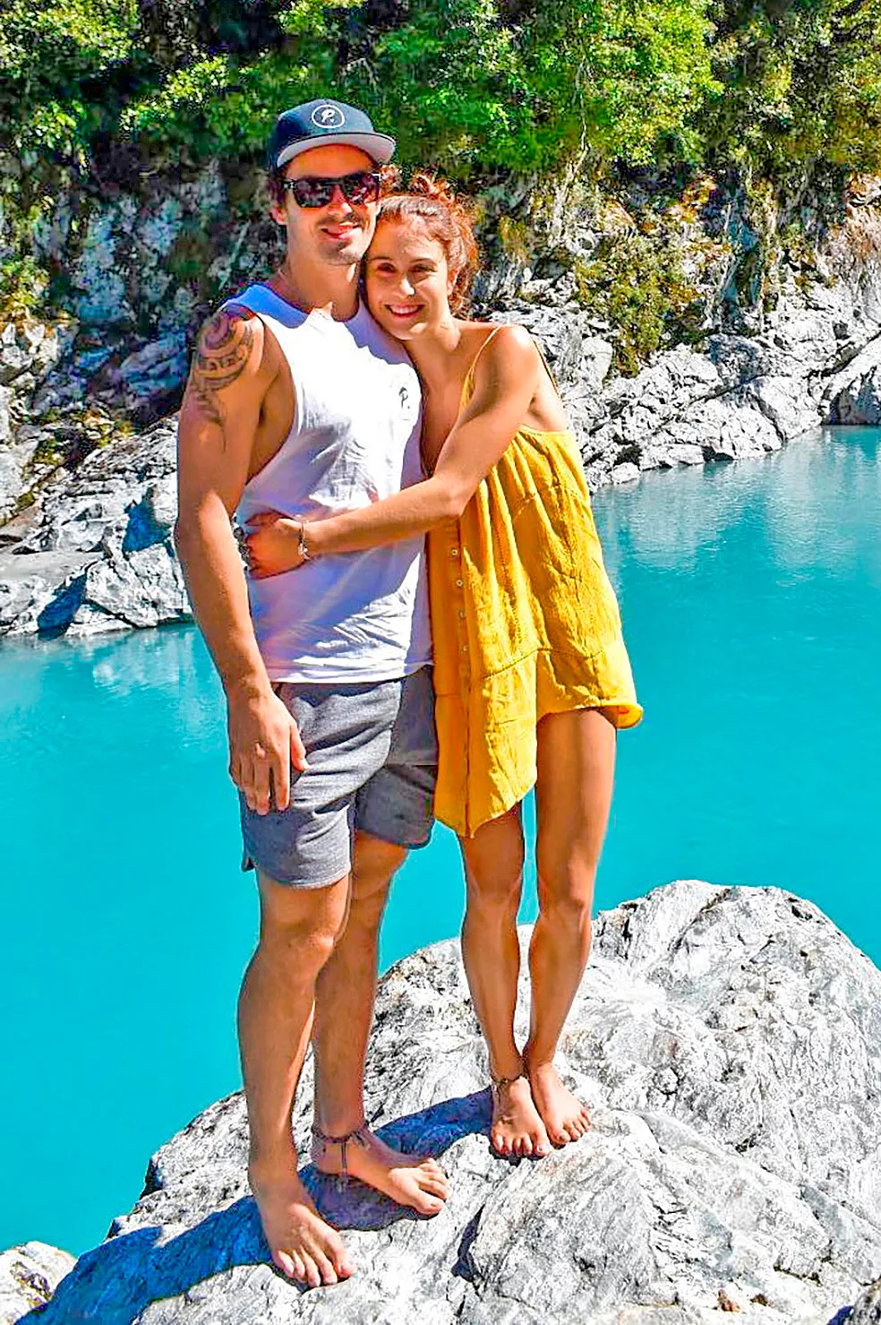 Paul Coll and Nele Gilis standing on a rock