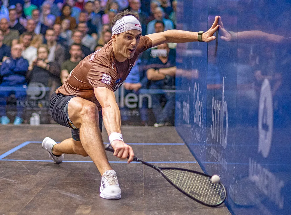 Paul Coll in action playing Squash