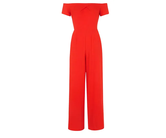 Bright red, off-the-shoulder jumpsuit with wide legs, designed for a chic, elegant look.