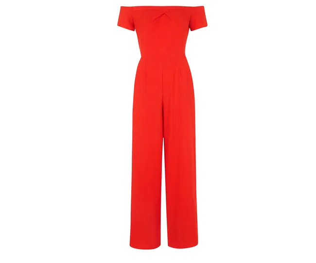 Bright red, off-the-shoulder jumpsuit with wide legs, designed for a chic, elegant look.