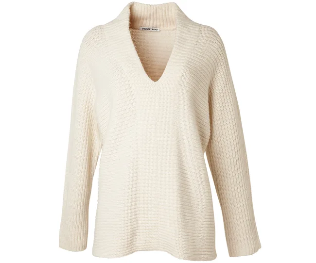 Cream-colored, long-sleeve, V-neck knitted sweater by Country Road.