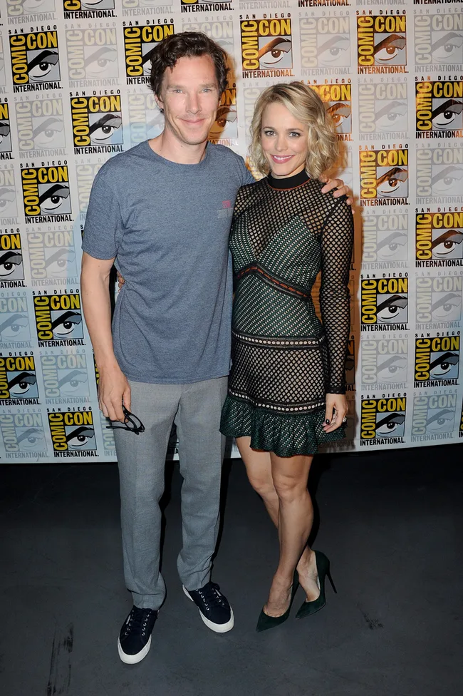 Man and woman posing together at Comic-Con event.