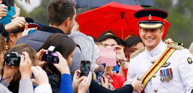 Prince Harry posing for photos