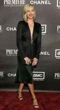 Charlize kisses butt
