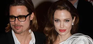 Angelina Jolie smolders in flowers