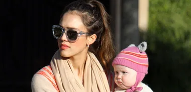 Jessica Alba covers up sick