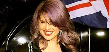 Kelly Osbourne sprains ankle to avoid falling in toilet.