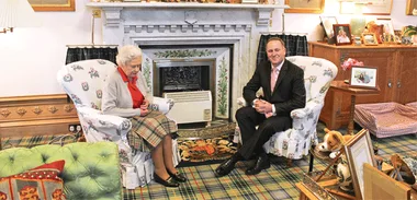 John Key sits with the queen