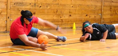 Valerie Adams helps young disabled athlete