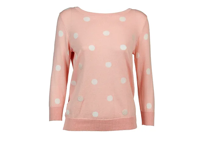 Light pink long-sleeve sweater with white polka dots.